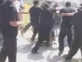 Zionist Security Guards use electric stun guns on the Jewish demonstrators - Hebrew